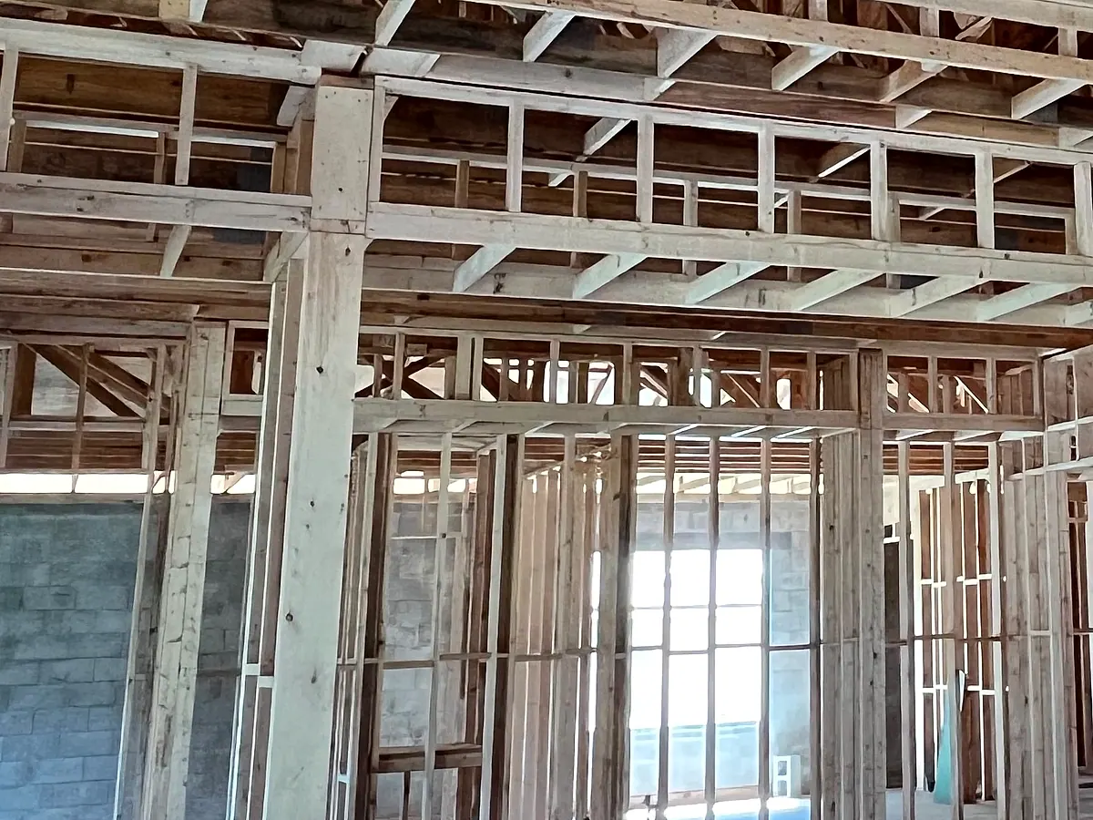 Load-bearing wall studs and floor system framing